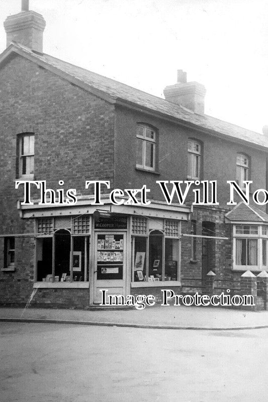 DE 3912 - W Cooper Photographer Shop, Rosebery Road, Exmouth c1920