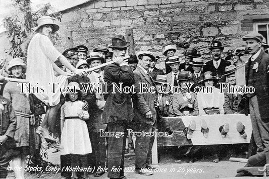 NH 1630 - In The Stocks, Corby Pole Fair, Northamptonshire 1922
